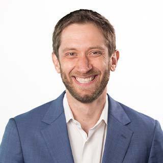 Headshot of Joel Adler.