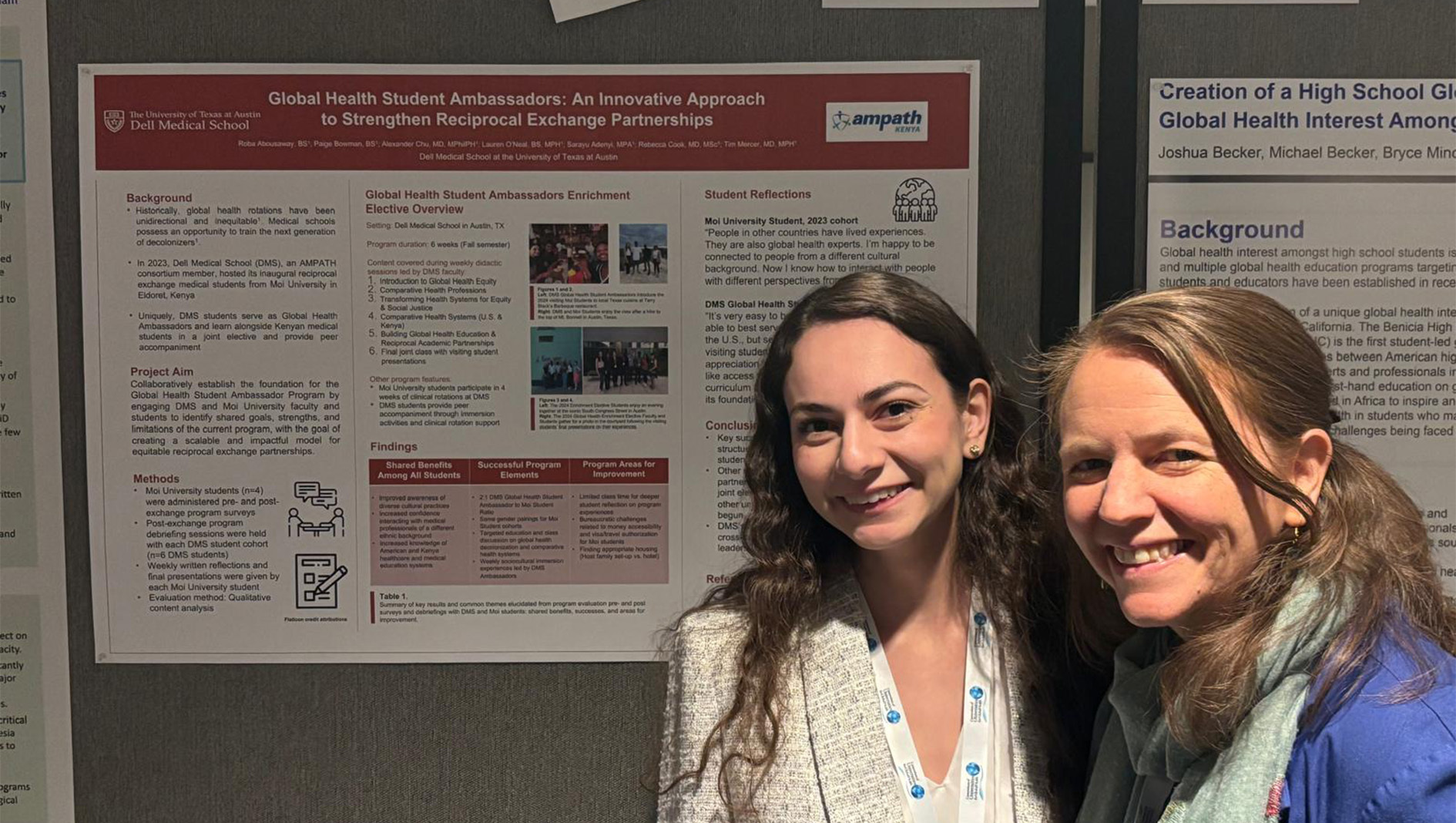 Roba Abousaway (left) stands by her winning poster alongside Rebecca Cook (right).