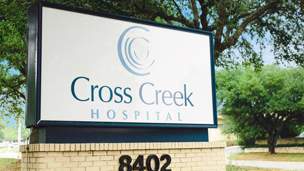 Cross Creek Hospital sign.