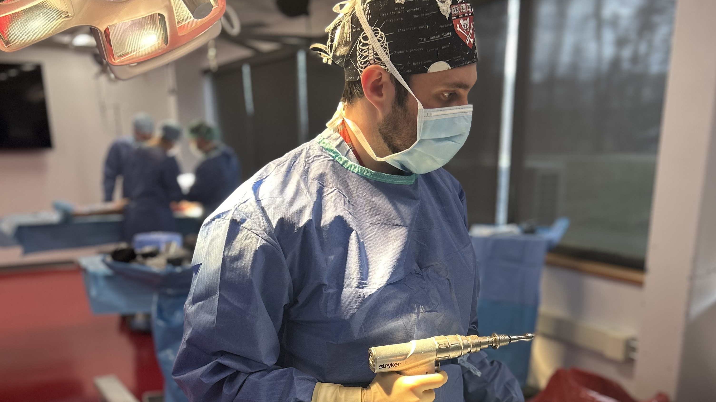 Jeremiah Alexander performs a surgical procedure.